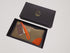 Pochette passepartout tabacco e arancio - Voiceat